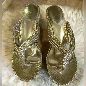 Carlos Santana gold wedge sandal. Size 8. Gently worn.